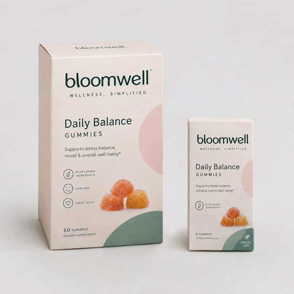 Photorealistic packaging mockup of two matching wellness gummy supplement boxes, full-size and travel-size