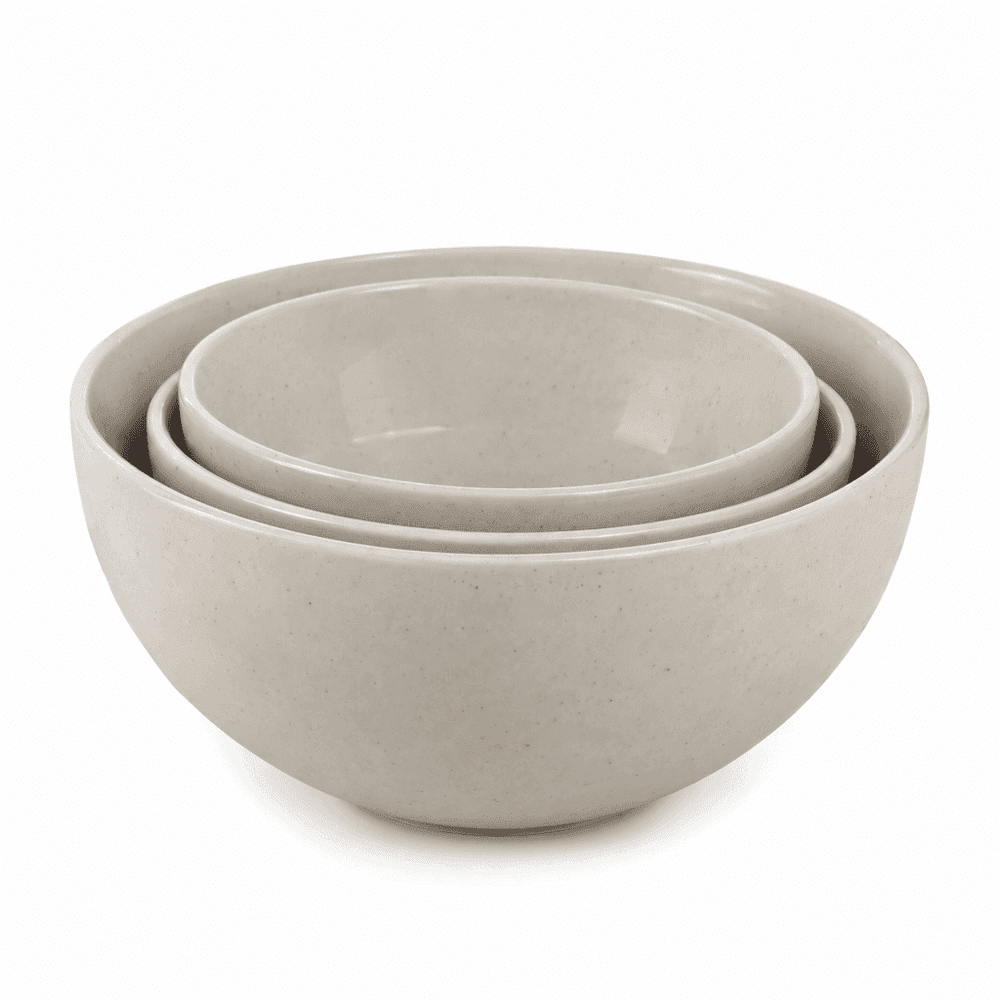 Set of three nested ceramic bowls in different sizes on a white background, e-commerce catalog photo